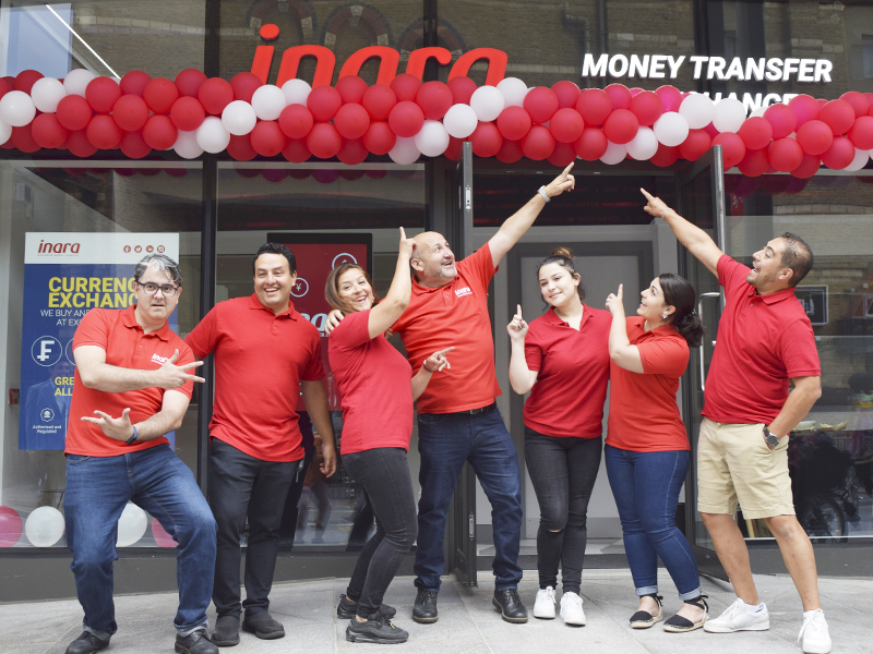 team Inara Money Transfer at the front of the store